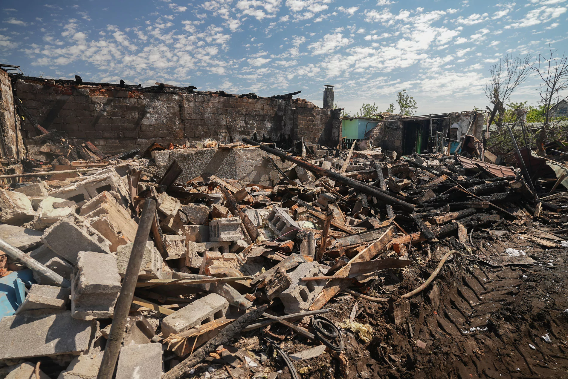 Damaged house in the the Novobavarskyi district