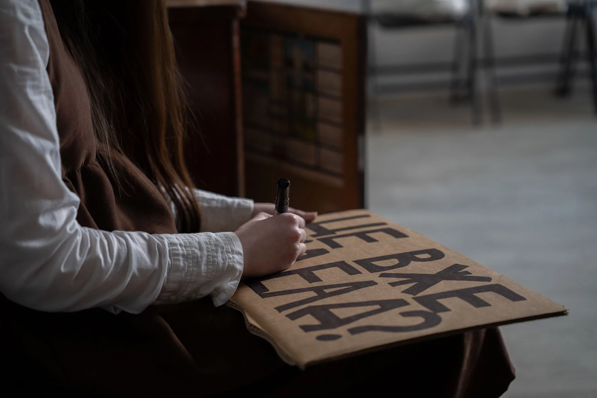 Lera is working on her placard