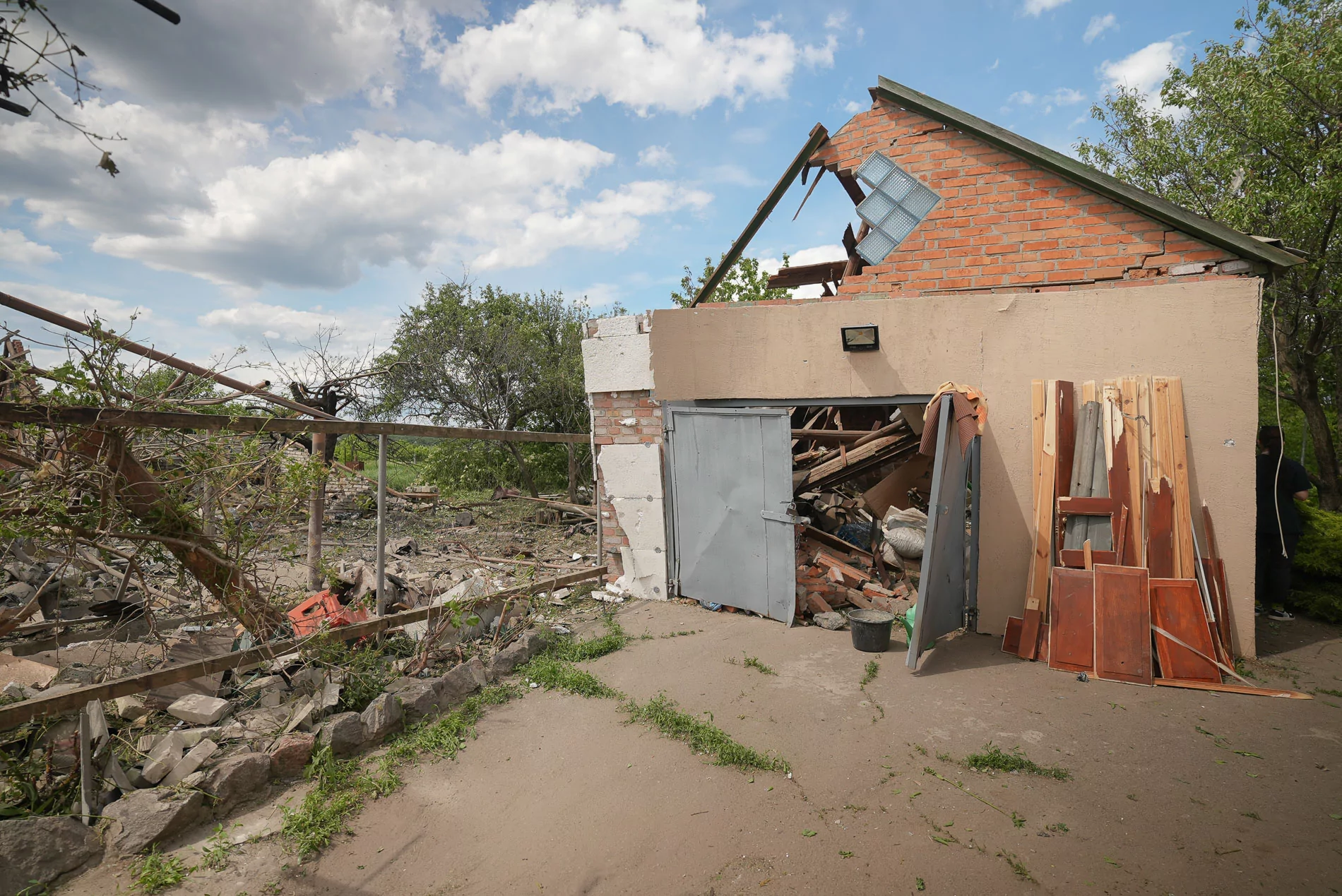 Russian attack damaged house in Rokytne, Kharkiv oblast