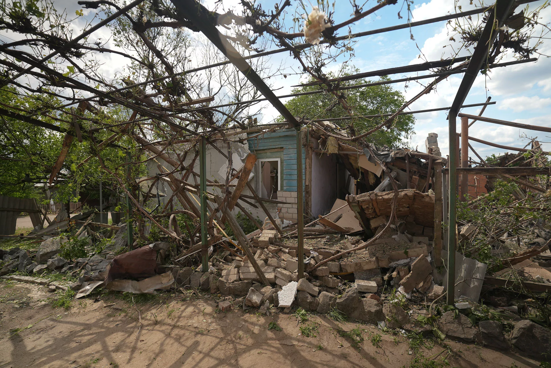 Russian attack damaged house in Rokytne, Kharkiv oblast