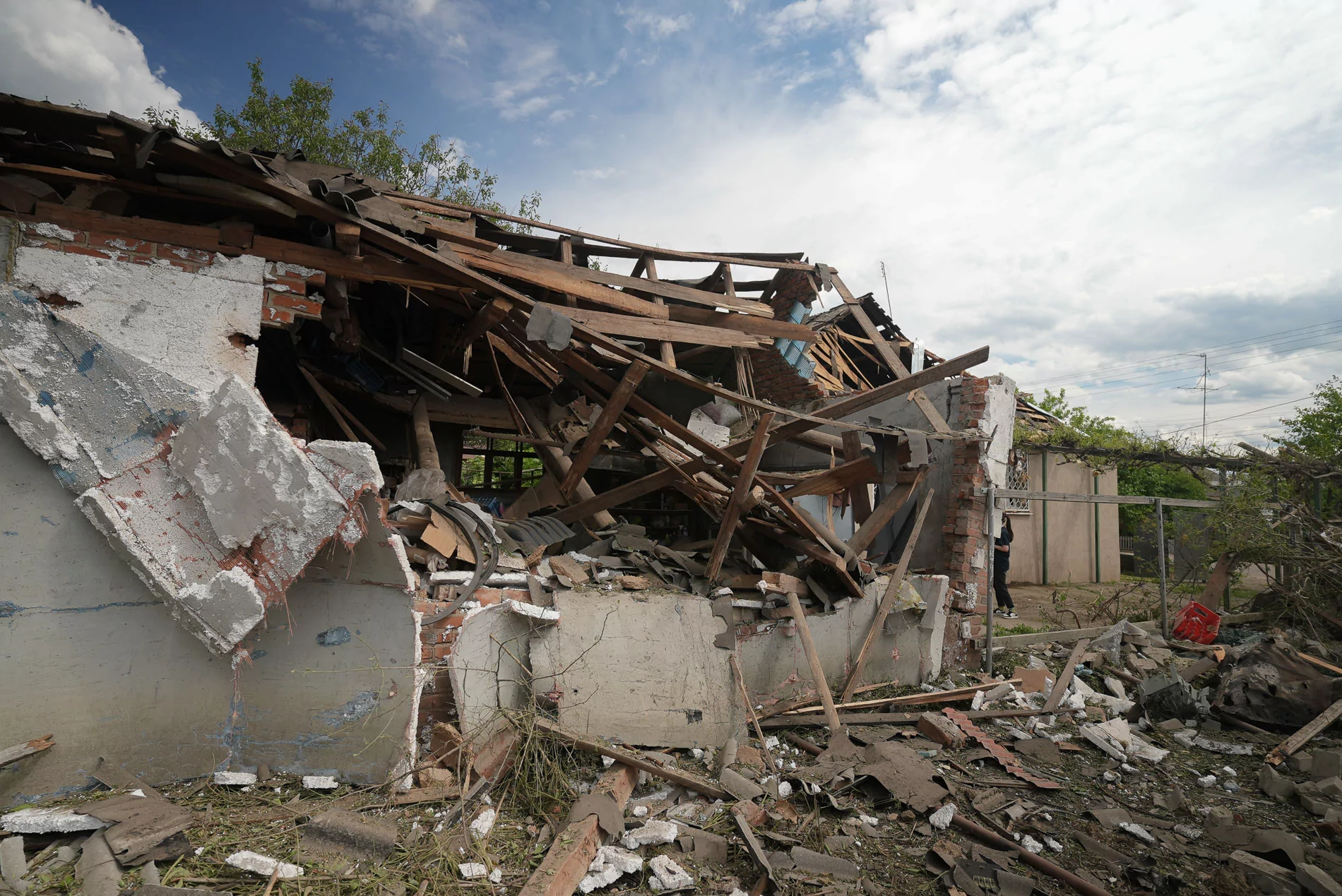 Russian attack damaged house in Rokytne, Kharkiv oblast