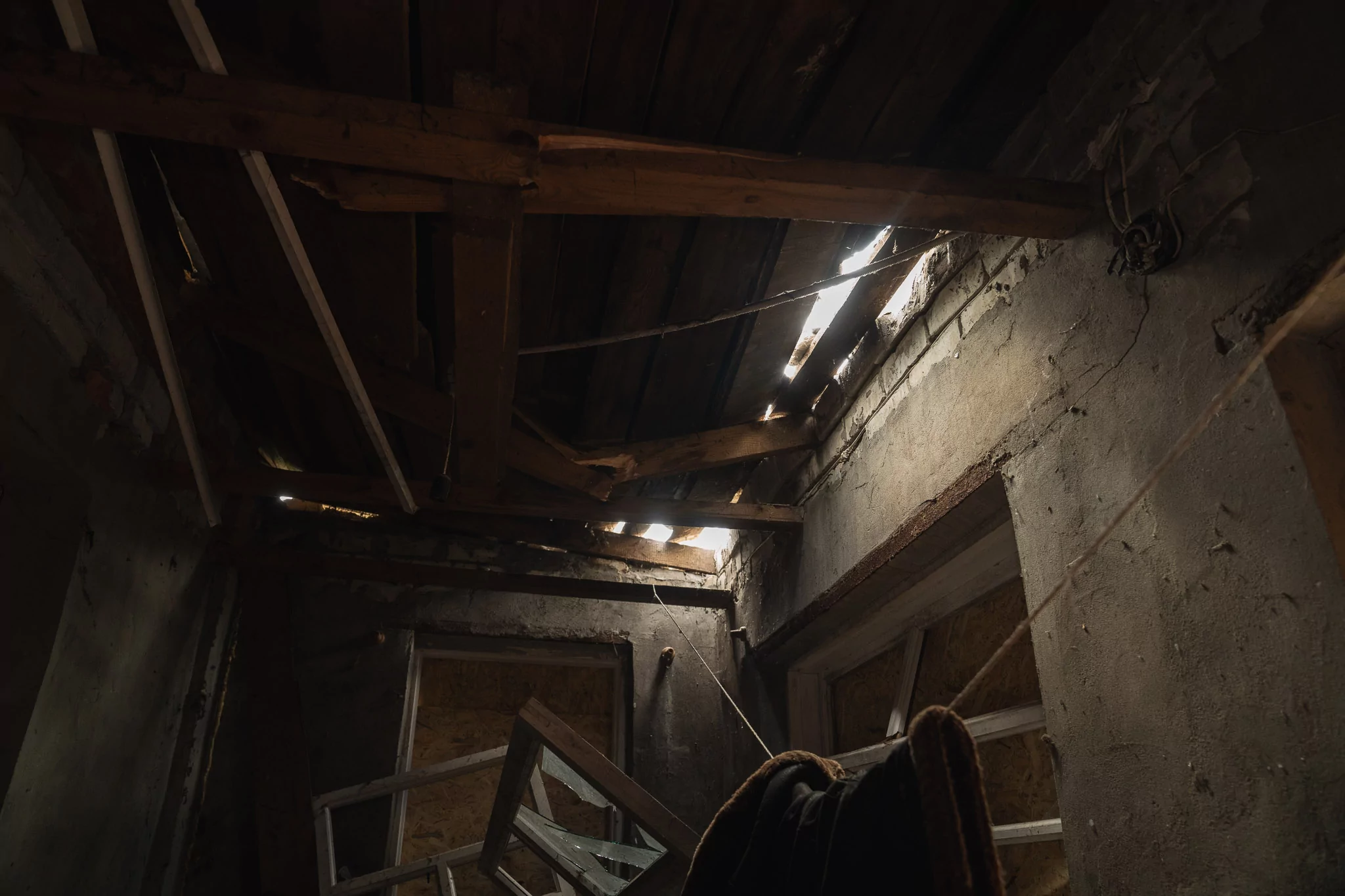 Holes in the roof of Tetiana's house after the Russian glide bomb attack on Jun. 19, 2026