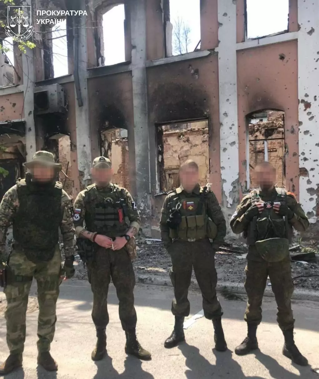 Russian soldiers, who are charged with torturing civilians in the Izium district