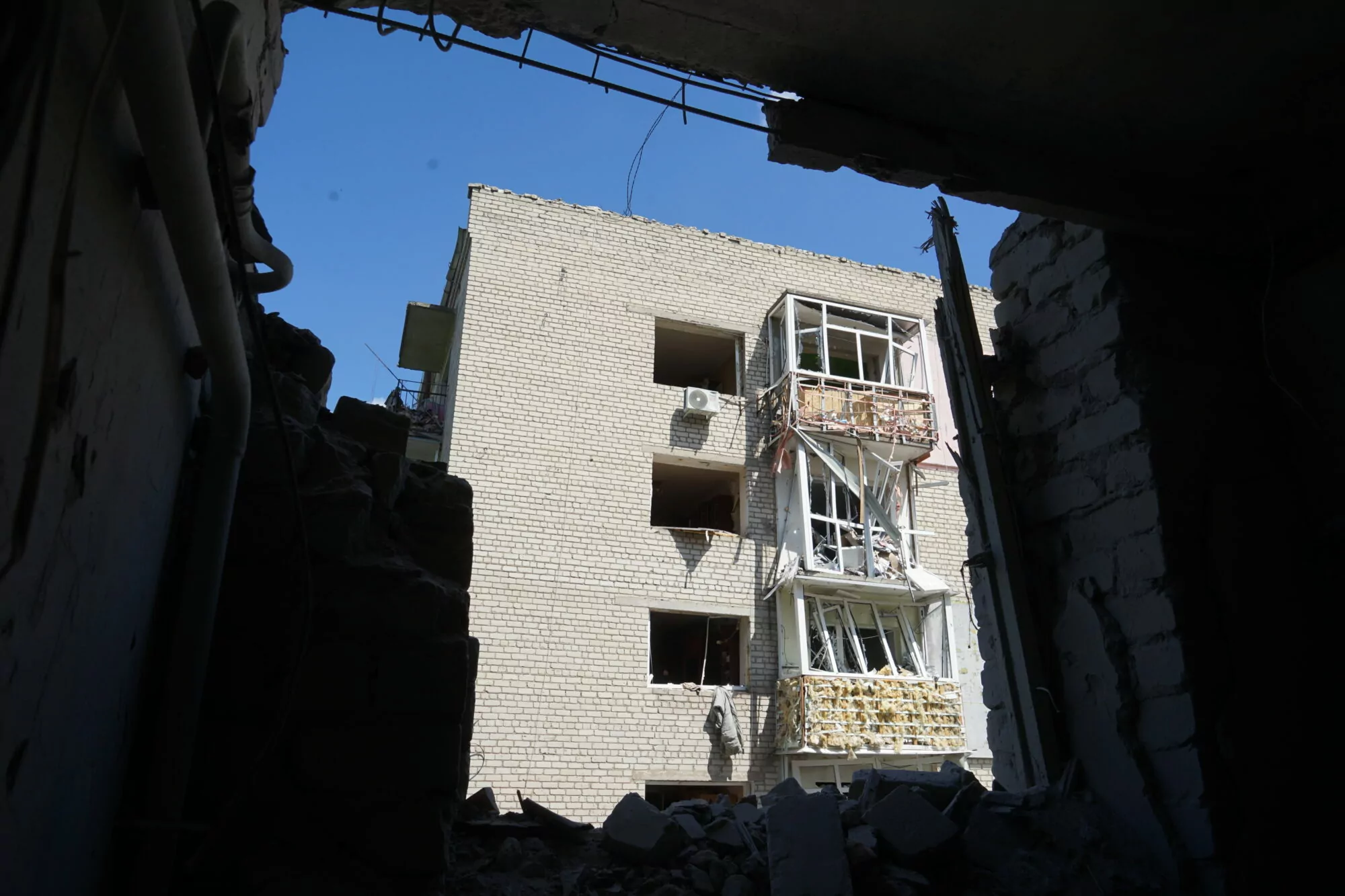 Damaged apartment building in Izium