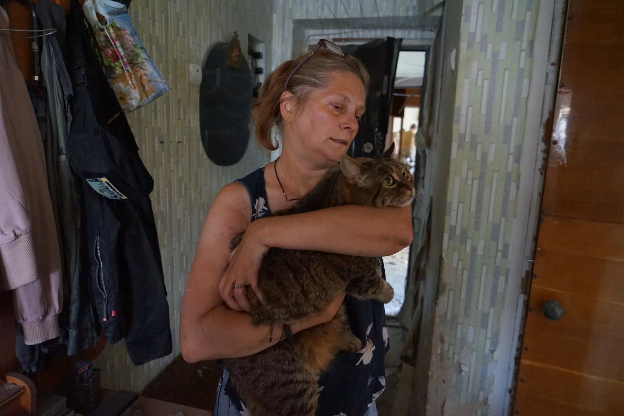 A woman rescues a cat