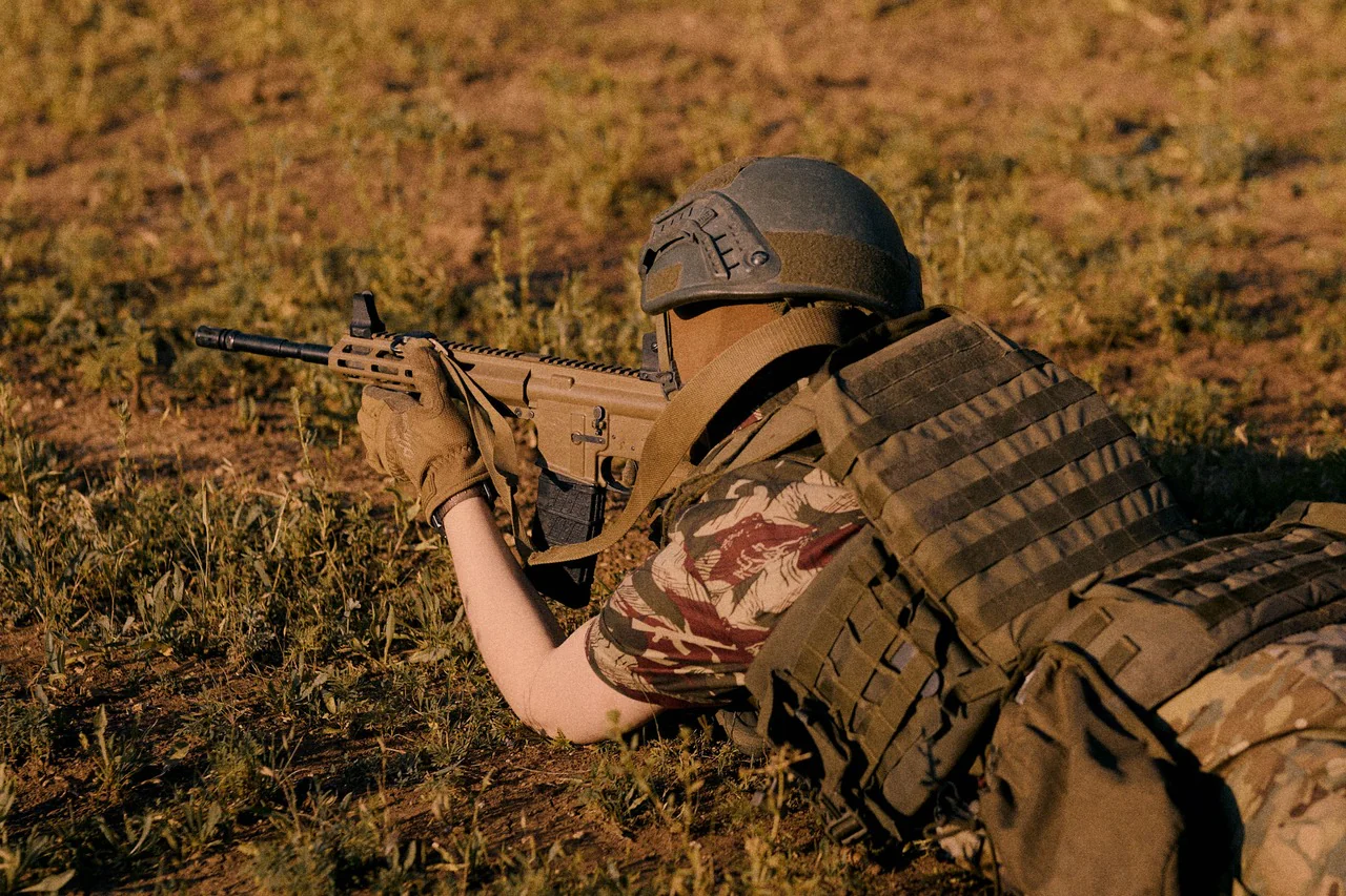Femka practices shooting from a prone position