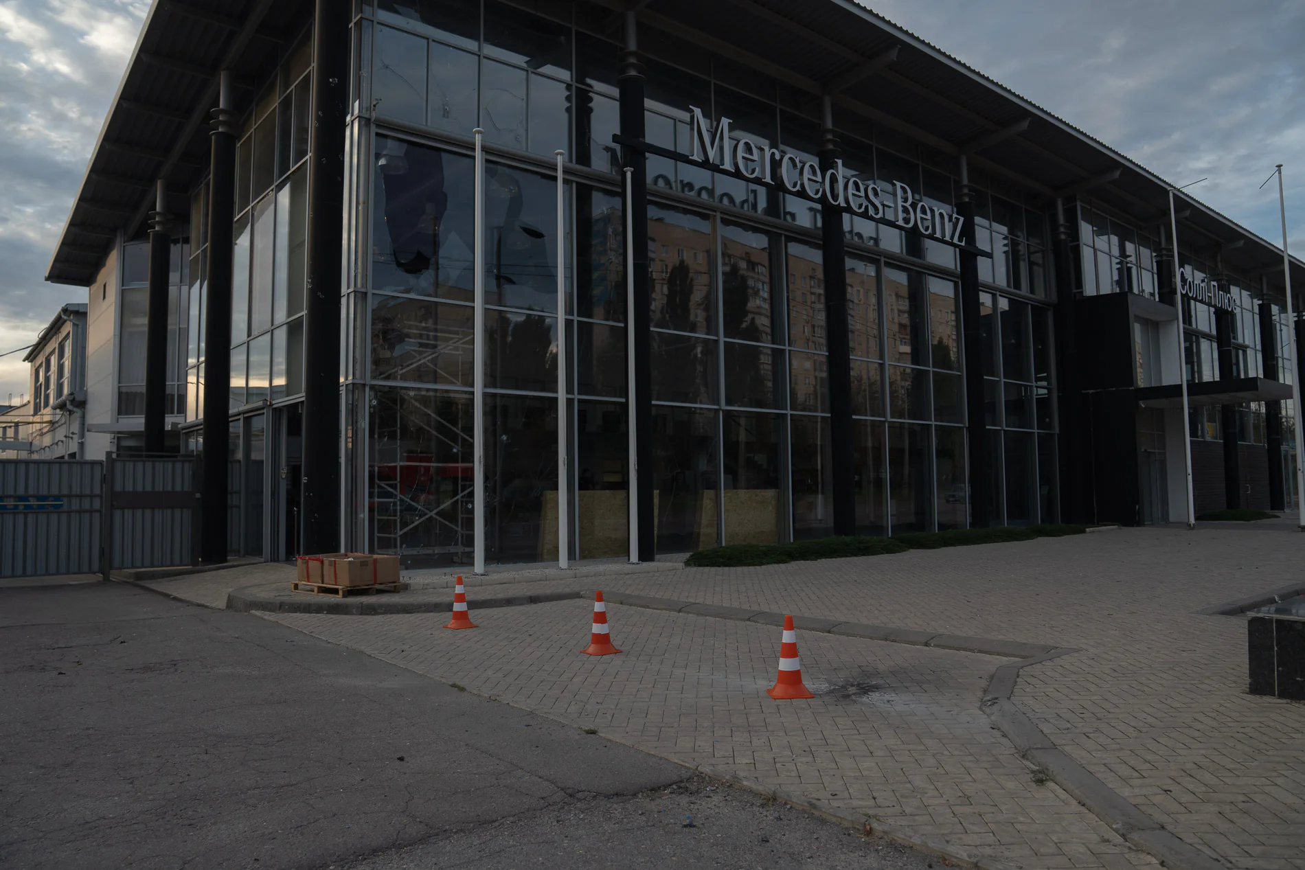 Damaged car dealership in Kharkiv