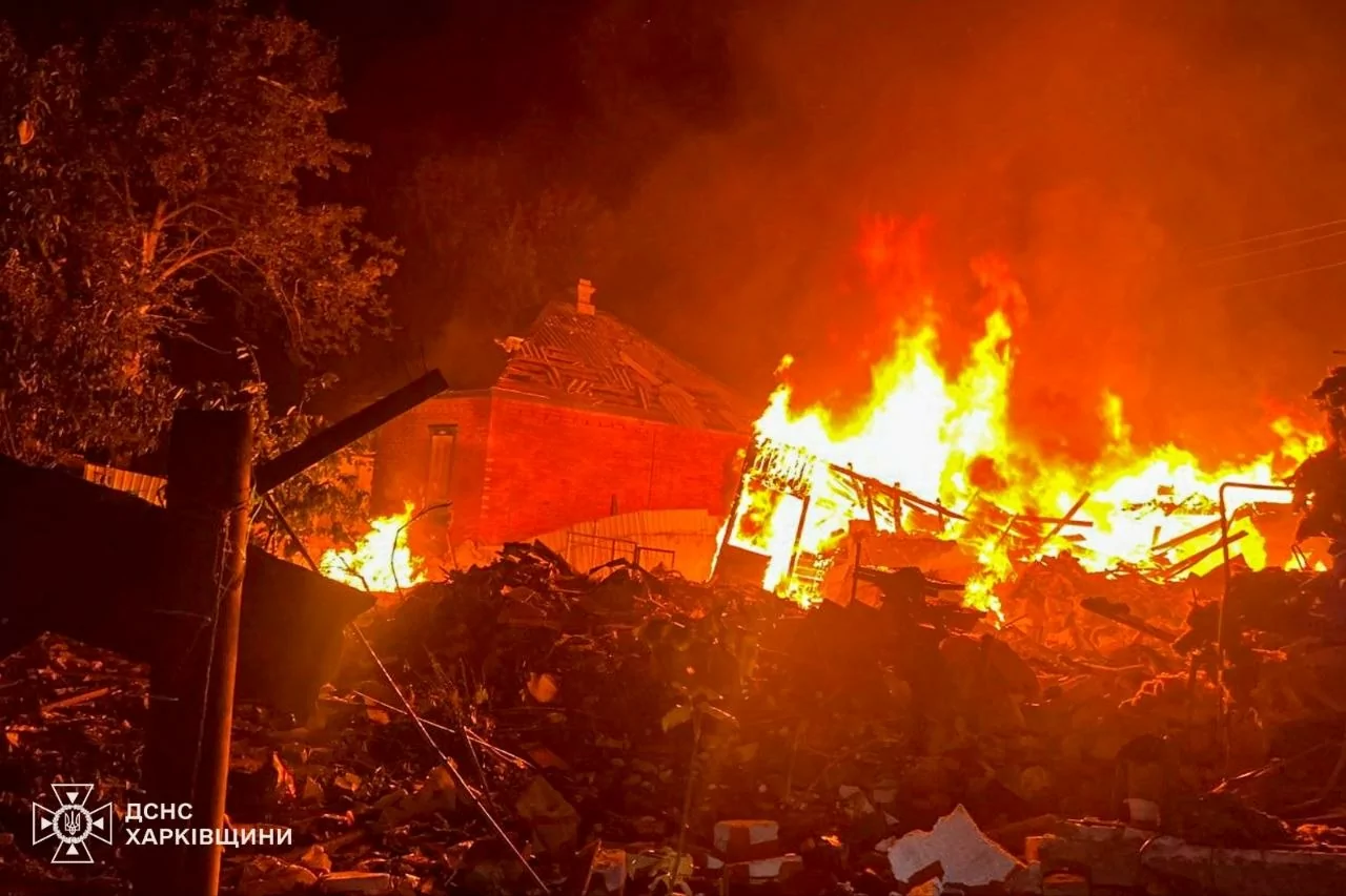 The house is on fire after Russian attack on Kharkiv oblast