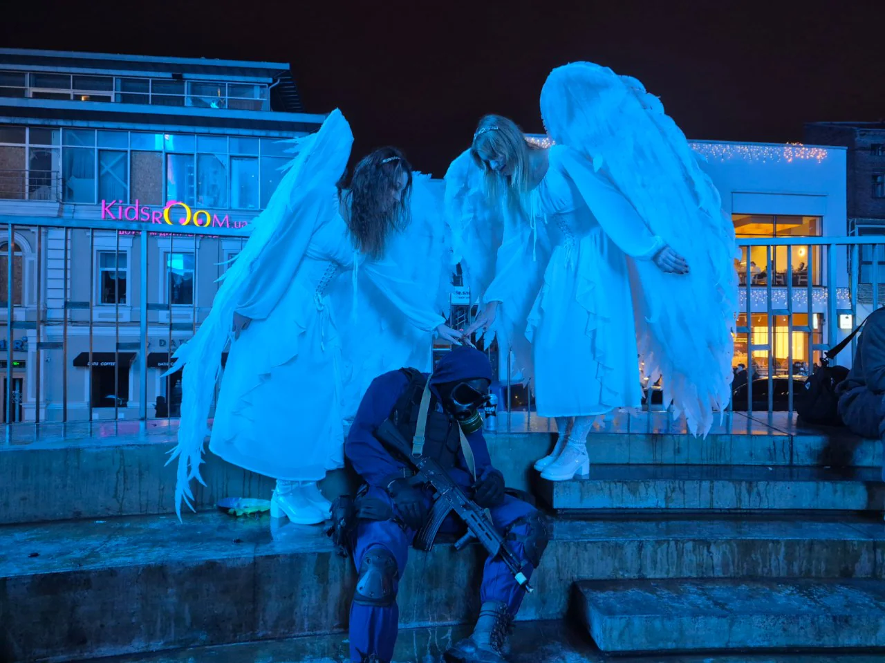 Three people in Halloween costumes in the center of Kharkiv on Oct. 31, 2026 / Photo: Ivan Marshak for Gwara Media