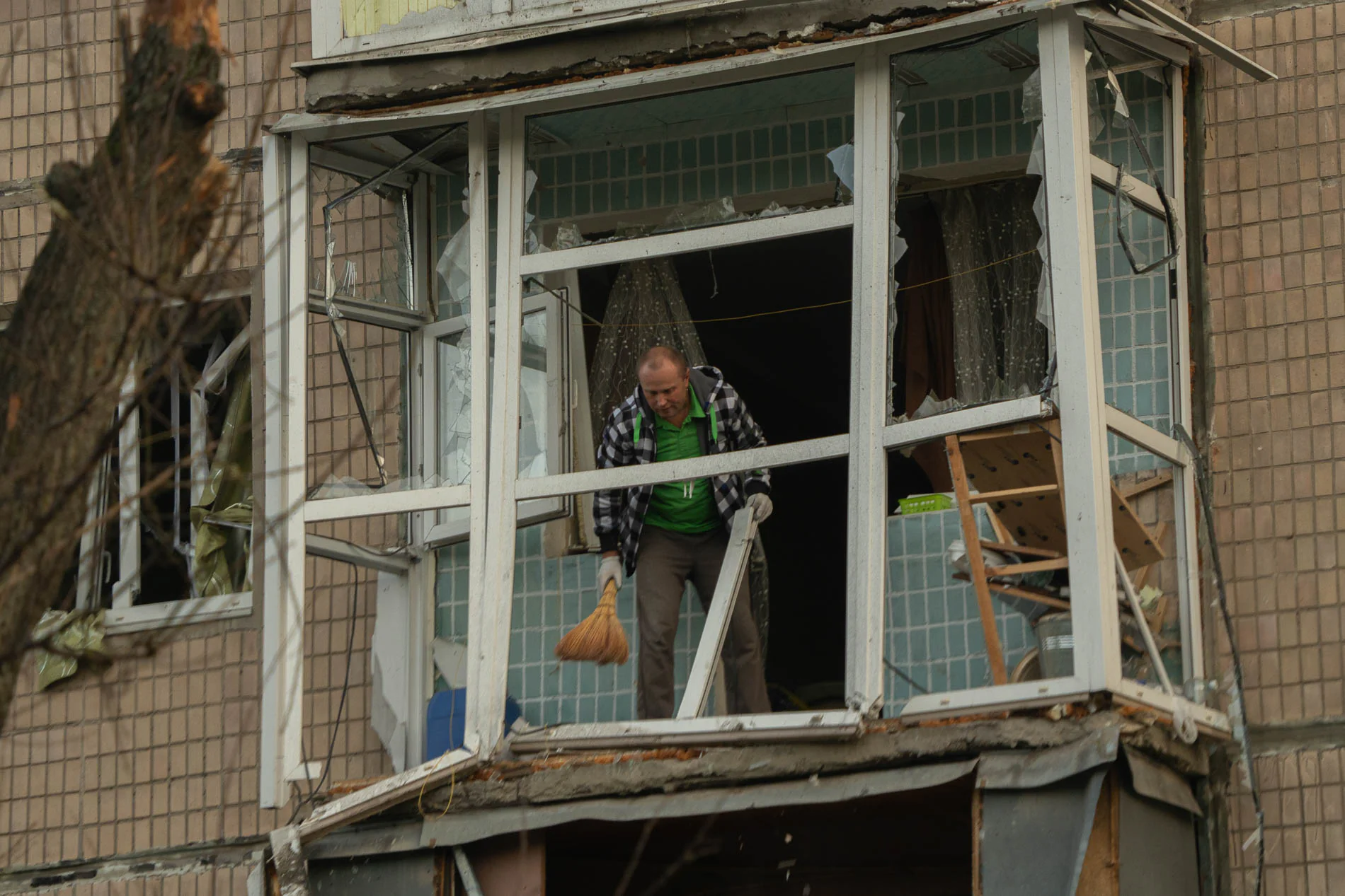 Kharkiv locals in damaged building
